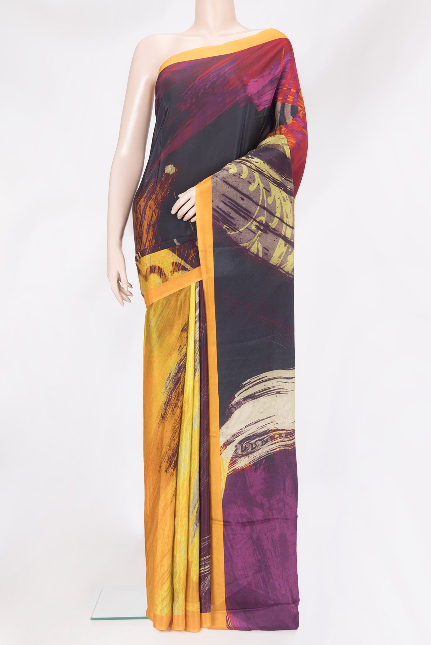 Multi Color Crepe Saree with Printed design on the body and Plain Border.  displayed on a mannequin