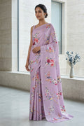 Model wearing a Lavender Mysore Crepe Saree with Floral Print on the body and Without Border.