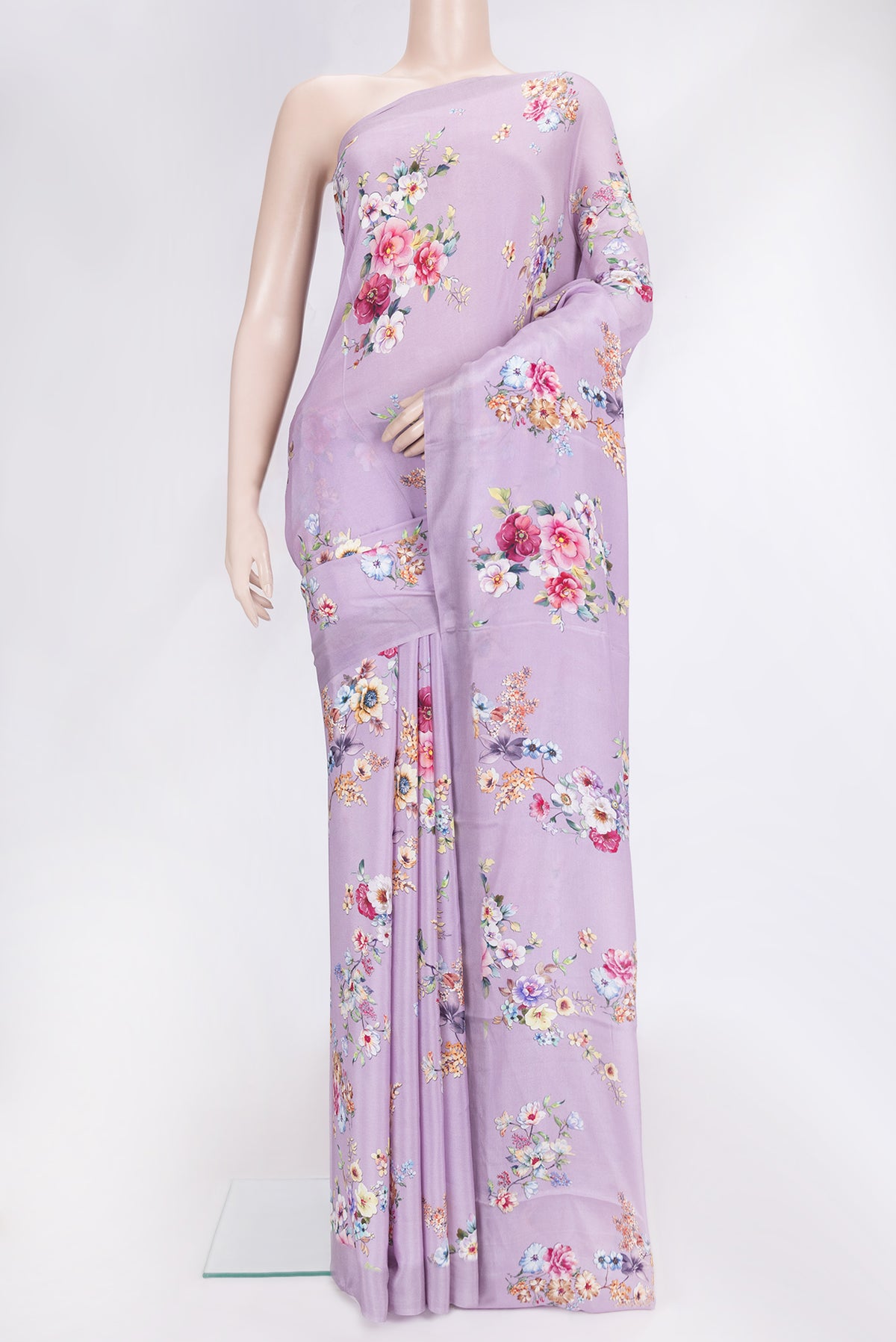 Lavender Dual Tone Mysore Crepe Saree with Printed design on the body and Without Border.  displayed on a mannequin