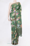 Olive Green Tussar Silk Saree with Floral Print on the body and Zari Border.  displayed on a mannequin