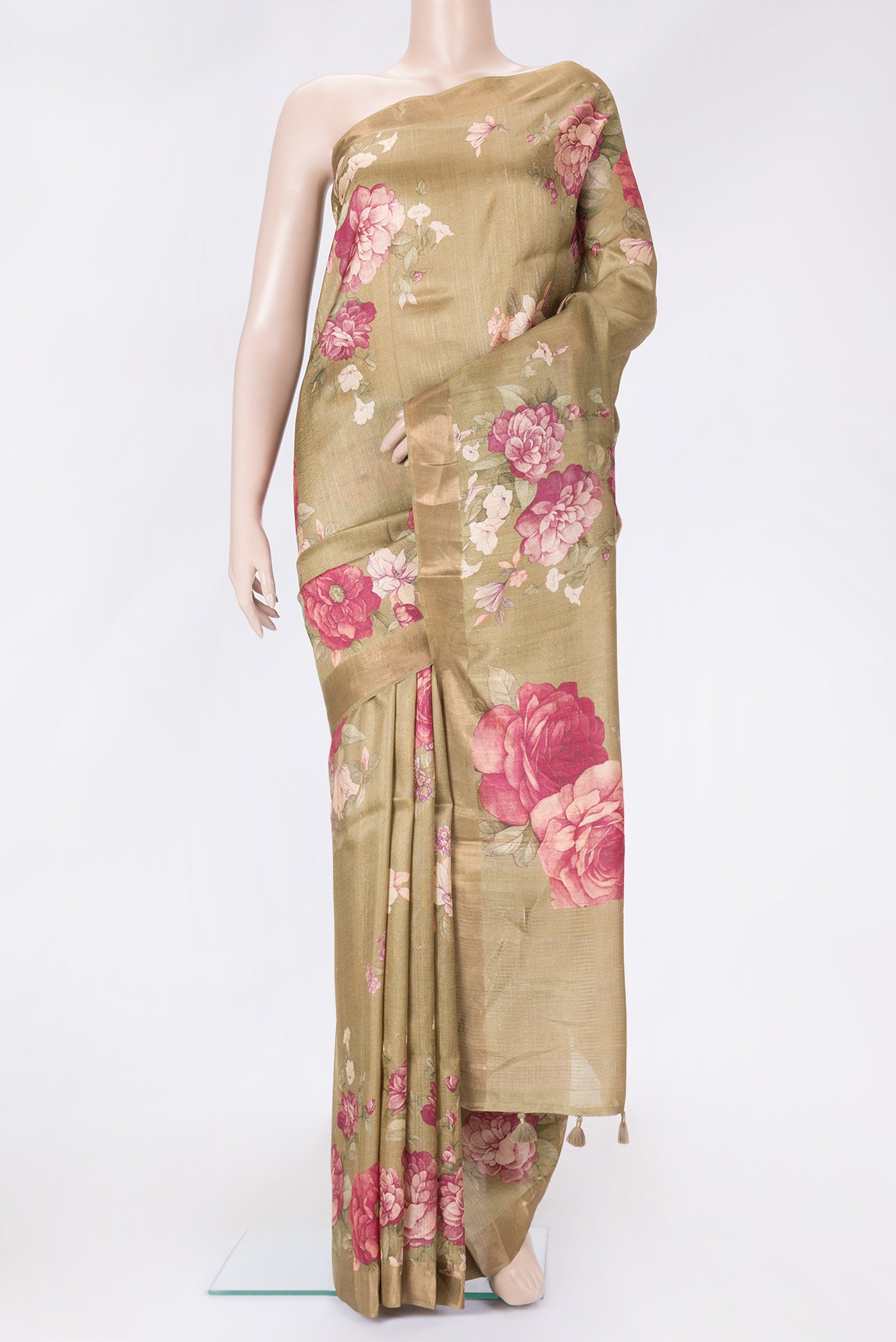 Mehandi Green Dual Tone Tussar Silk Saree with Printed design on the body and Zari Border.  displayed on a mannequin