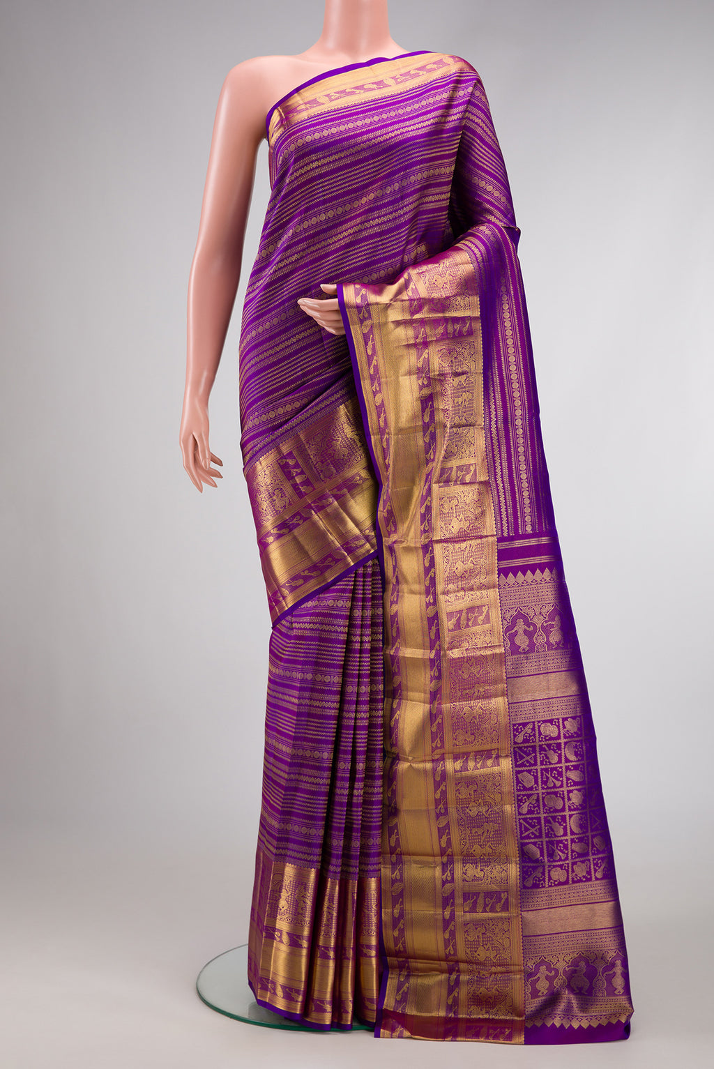 Purple Dual Tone Kanchipuram Silk Saree with Zari Brocade on the body and Zari Border.  displayed on a mannequin