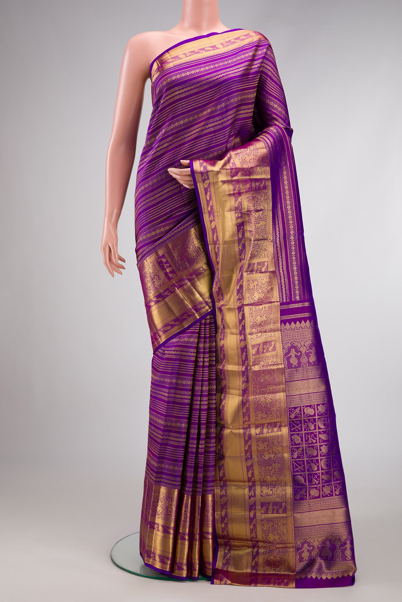 Purple Dual Tone Kanchipuram Silk Saree with Zari Brocade on the body and Zari Border.  displayed on a mannequin