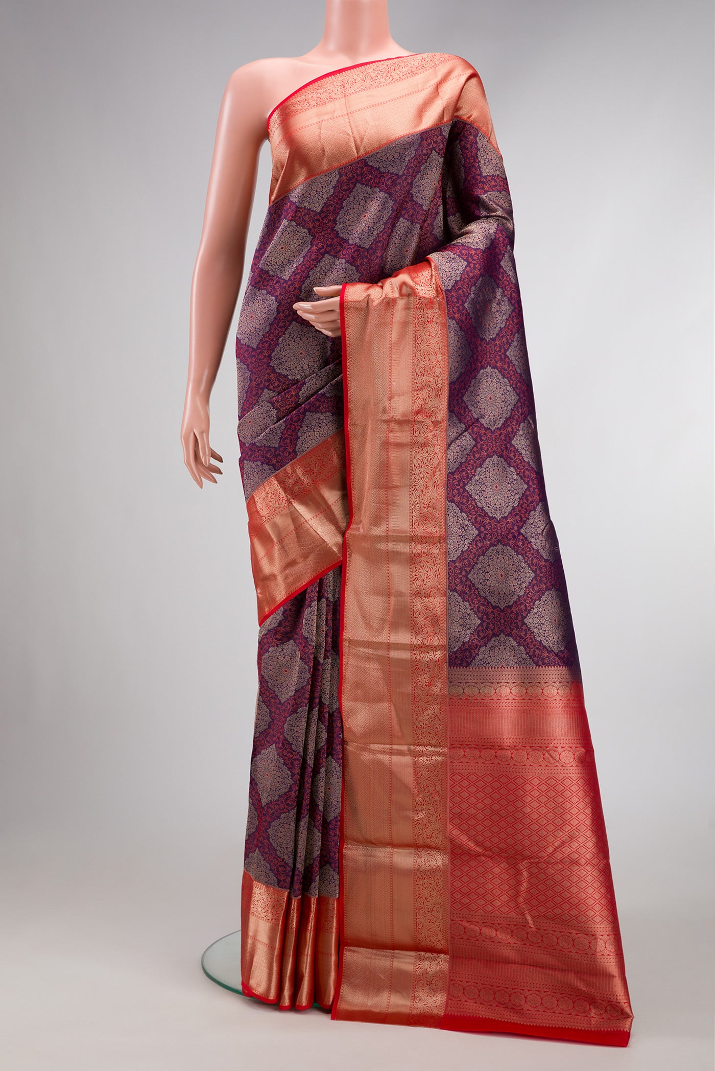 Light Magenta Dual Tone Kanjivaram Silk Saree with Zari Brocade on the body and Zari Border.  displayed on a mannequin