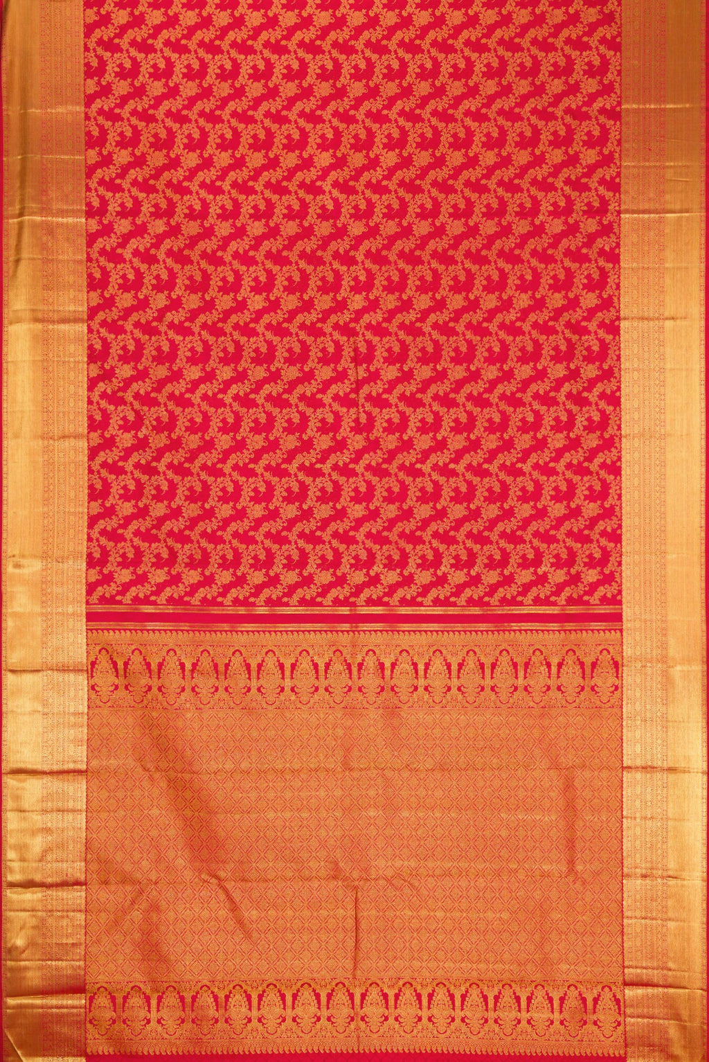 Flat view of Red Dual Tone Kanjivaram Silk Saree with Zari Brocade on the body and Zari Border. 