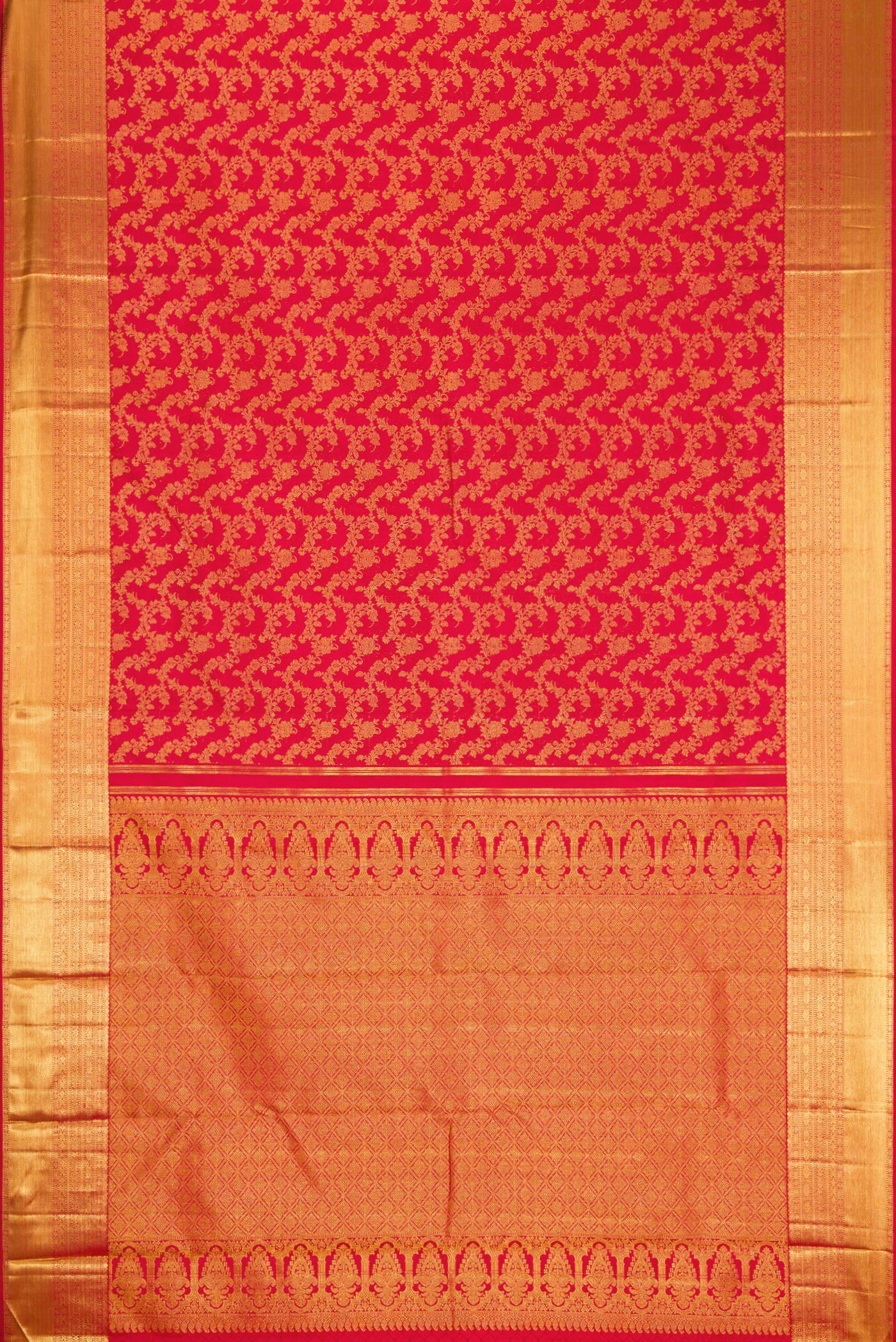 Flat view of Red Dual Tone Kanjivaram Silk Saree with Zari Brocade on the body and Zari Border. 