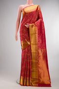Pure Silk Red Kanjivaram Saree with Zari Brocade on the body and Zari Border.  displayed on a mannequin
