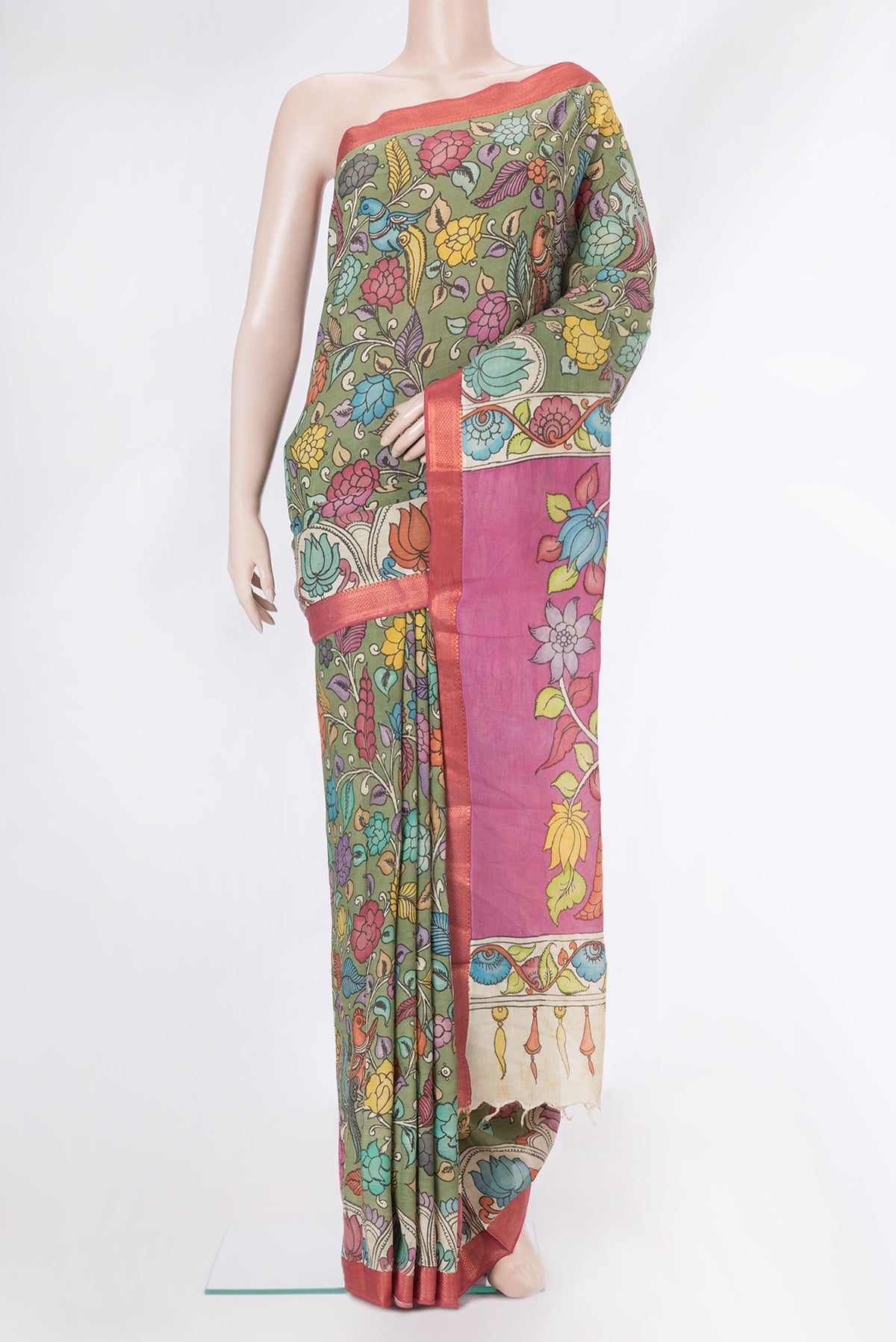 Mehandi Green Dual Tone Tussar Silk Saree with Printed design on the body and Zari Border.  displayed on a mannequin