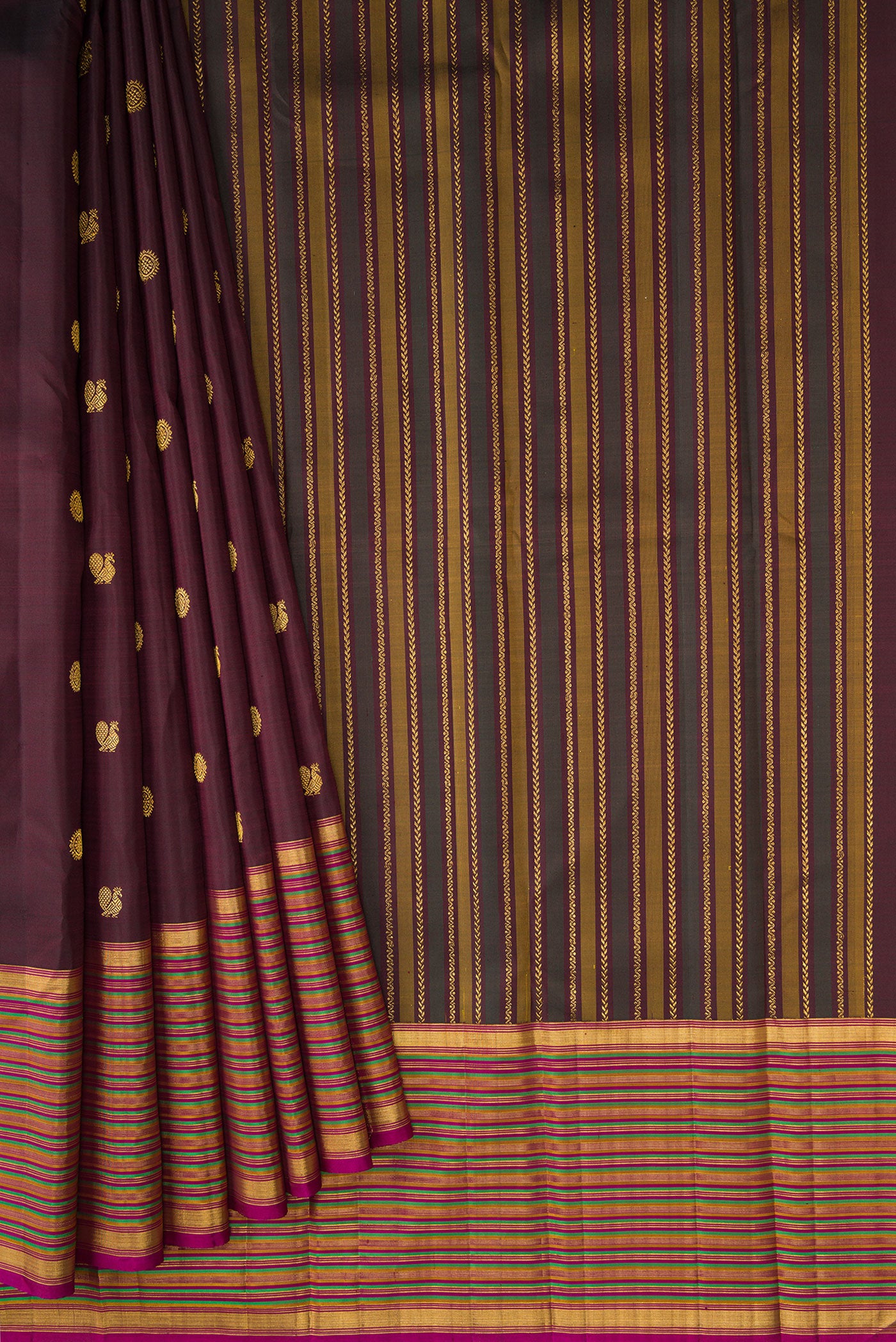 Pleats and pallu of Burgundy Dual Tone Kanjivaram Silk Saree with Zari Butta on the body and Zari Border. 