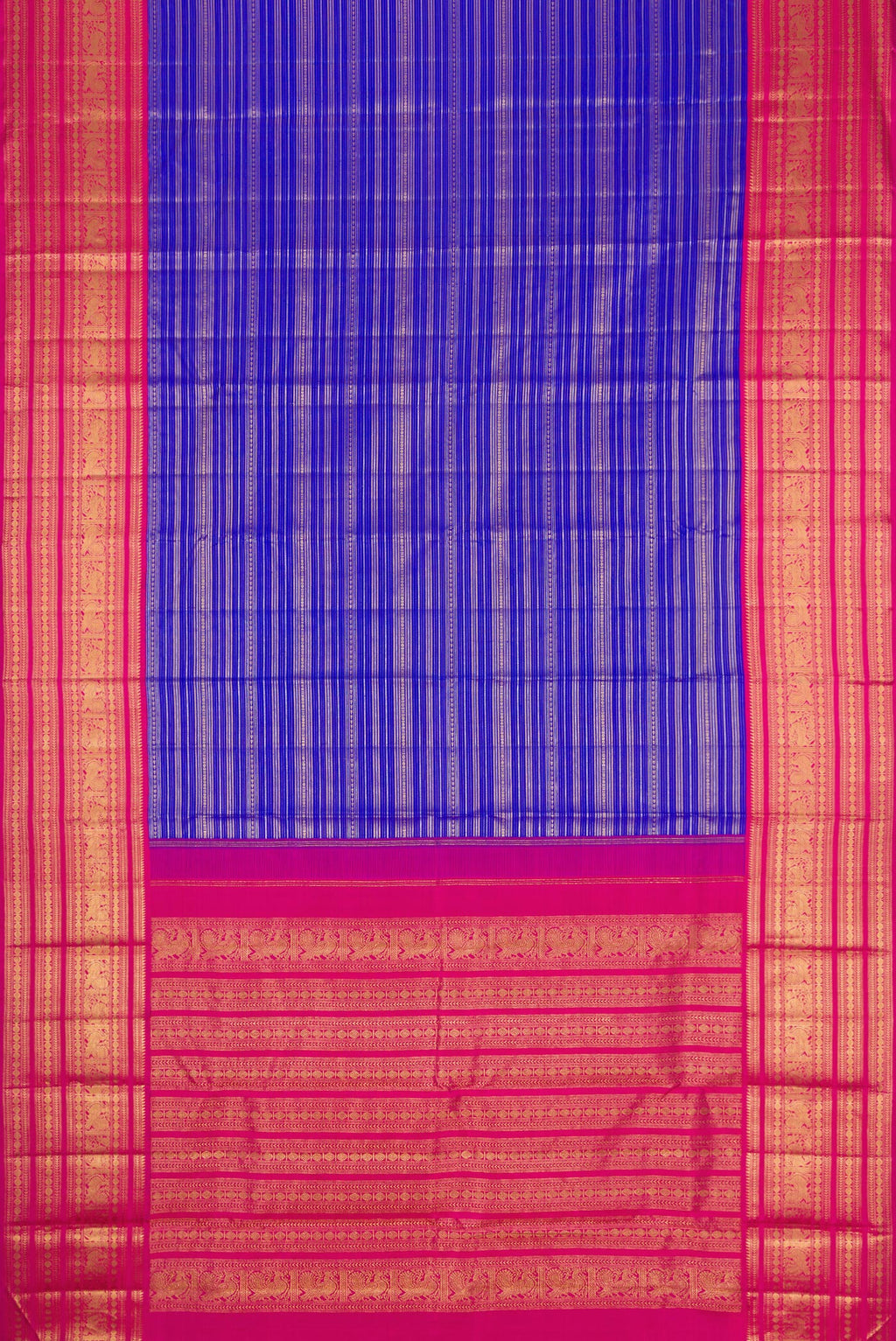 Flat view of Pure Silk Pure Zari Royal Blue Dual Tone Kanchipuram Saree with Stripes on the body and Zari Border. 