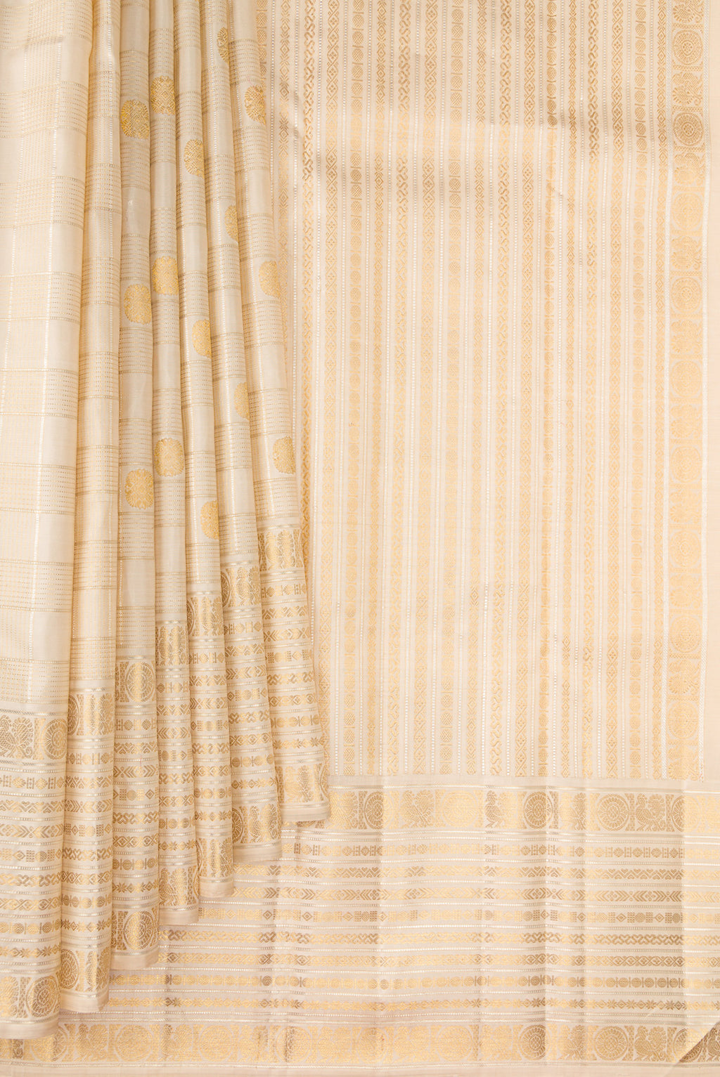 Pleats and pallu of Beige Dual Tone Kanchipuram Silk Saree with Checked design on the body and Fancy Border. 