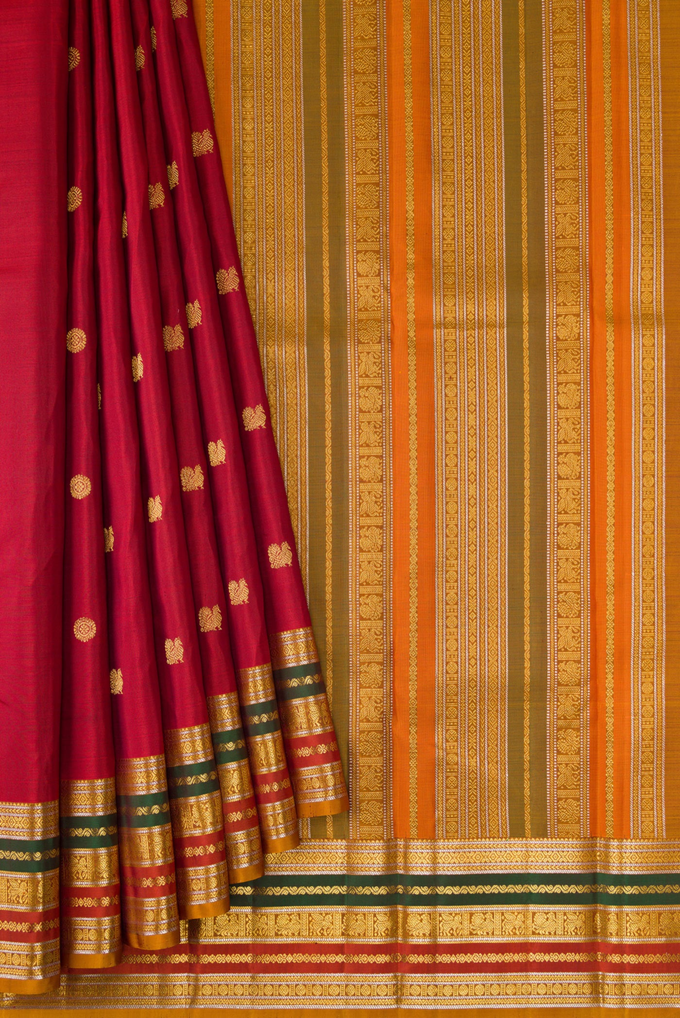 Pleats and pallu of Red Dual Tone Kanjivaram Silk Saree with Zari Butta on the body and Zari Border. 