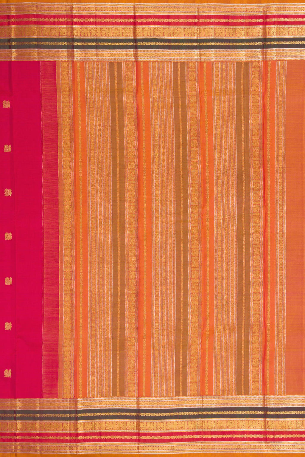 Close up image of the pallu of Dark Pink Kanjivaram Silk Saree with Zari Butta on the body and Zari Border. 