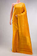 Yellow Dual Tone Kanchipuram Silk Saree with Checked design on the body and Zari Border.  displayed on a mannequin