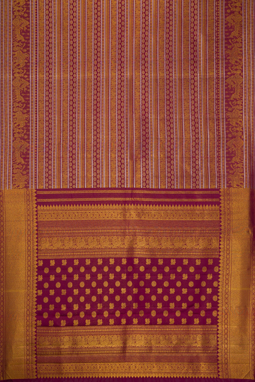 Flat view of Burgundy Dual Tone Kanchipuram Silk Saree with Zari Brocade on the body and Zari Border. 