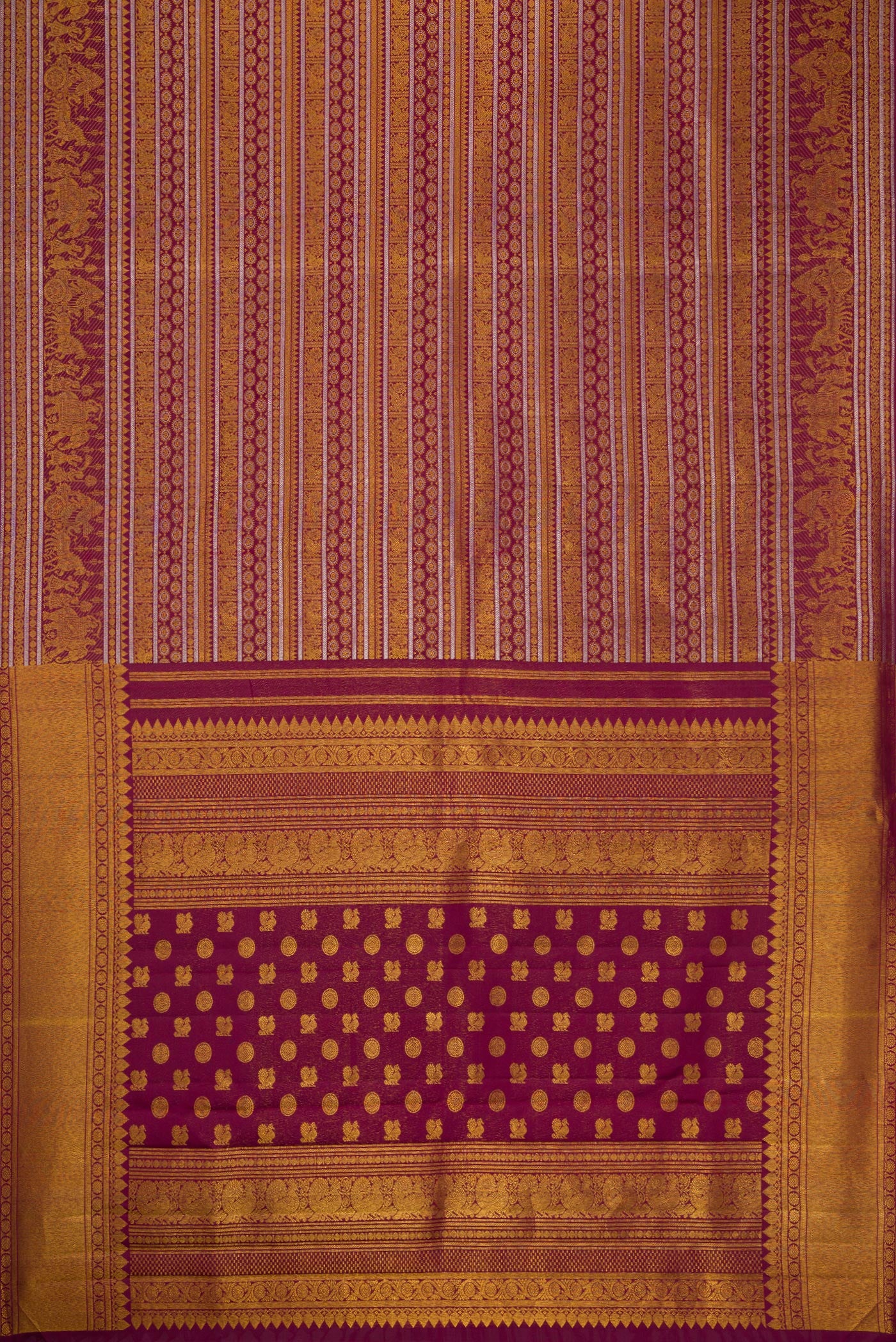 Flat view of Burgundy Dual Tone Kanchipuram Silk Saree with Zari Brocade on the body and Zari Border. 