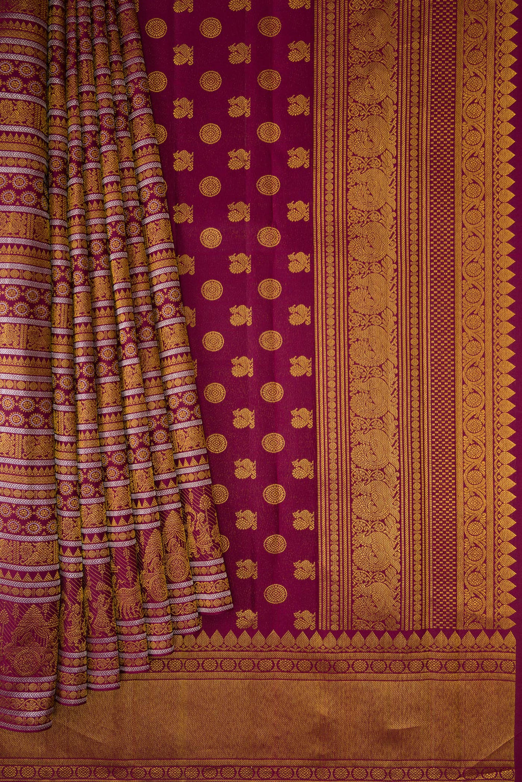 Pleats and pallu of Burgundy Dual Tone Kanchipuram Silk Saree with Zari Brocade on the body and Zari Border. 