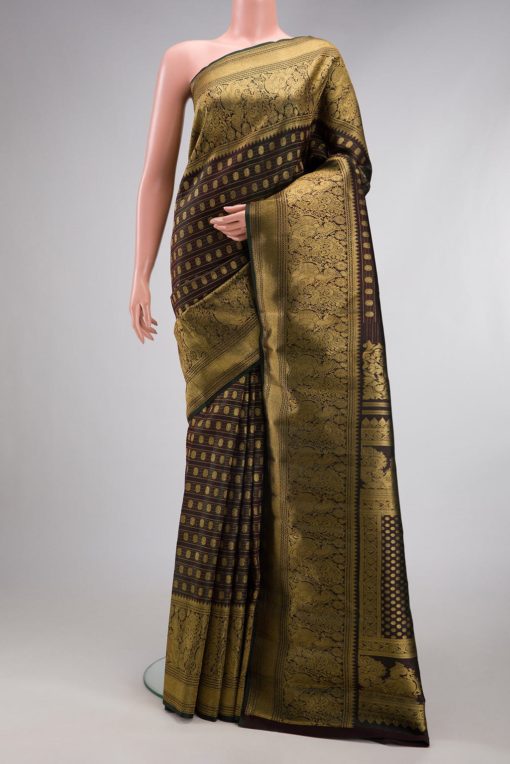 Coffee Brown Kanchipuram Silk Saree with Zari Brocade on the body and Fancy Border.  displayed on a mannequin