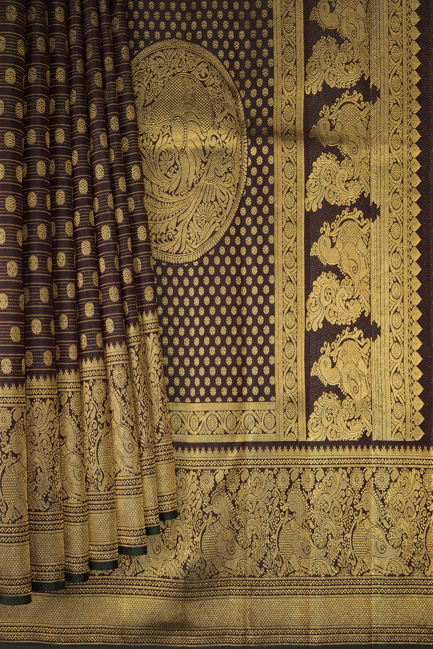 Pleats and pallu of Coffee Brown Kanchipuram Silk Saree with Zari Brocade on the body and Fancy Border. 