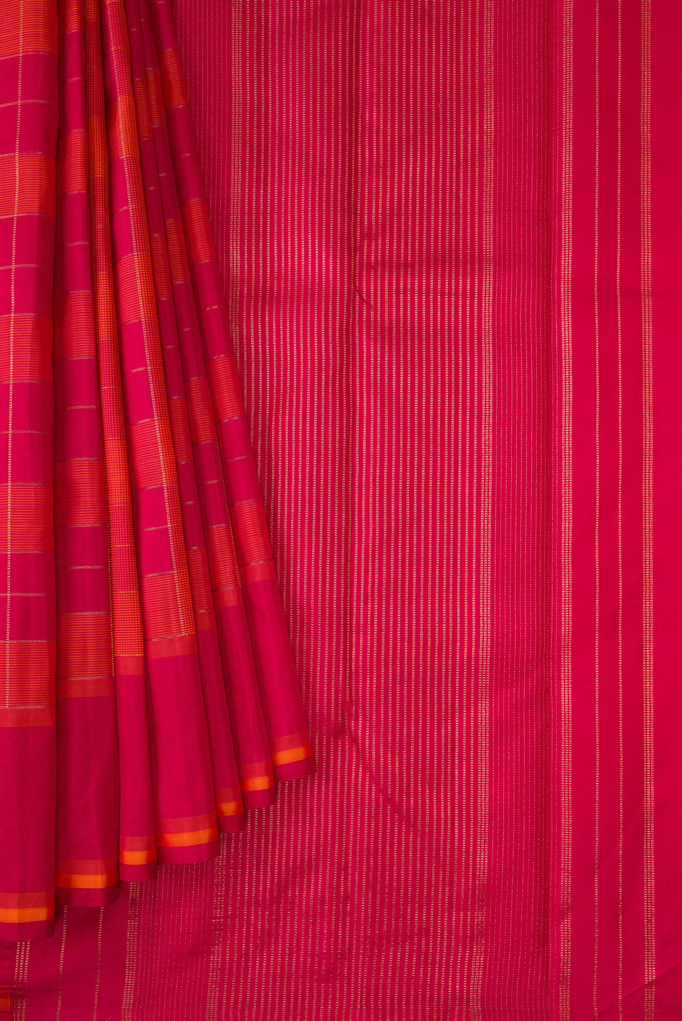 Pleats and pallu of Pure Silk Pure Zari Dark Pink and Brick Orange Color Kanchipuram Saree with Checked design on the body and Thread Border. 
