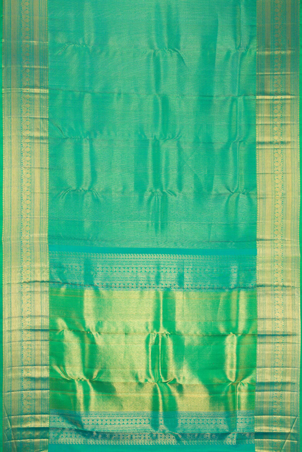 Flat view of Green Dual Tone Kanchipuram Silk Saree with Zari Brocade on the body and Fancy Border. 