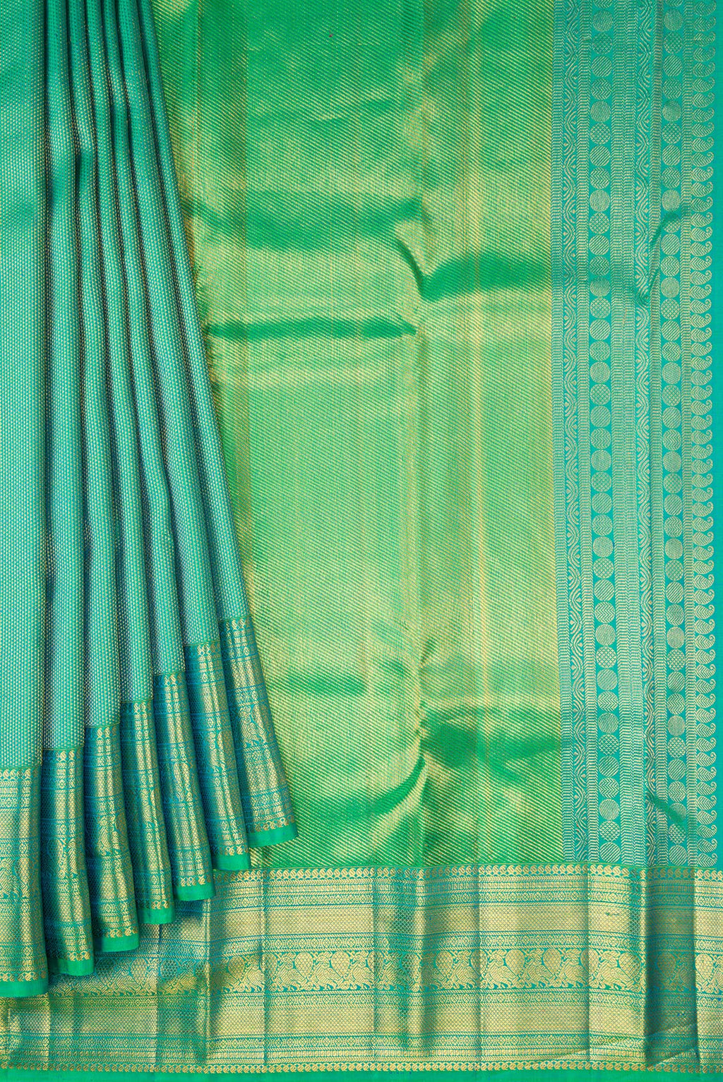 Pleats and pallu of Green Dual Tone Kanchipuram Silk Saree with Zari Brocade on the body and Fancy Border. 