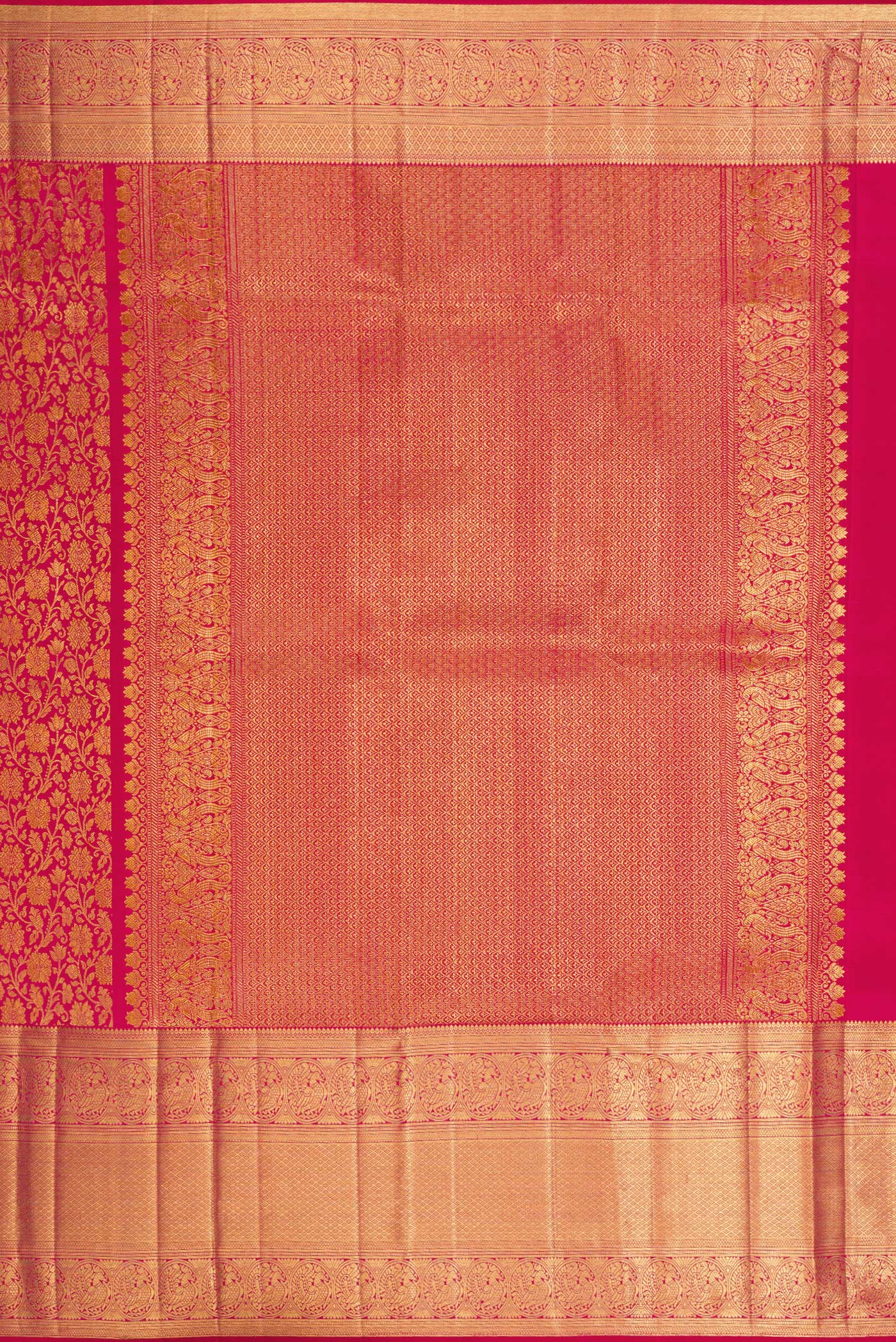 Close up image of the pallu of Dark Pink Kanchipuram Silk Saree with Zari Brocade on the body and Zari Border. 