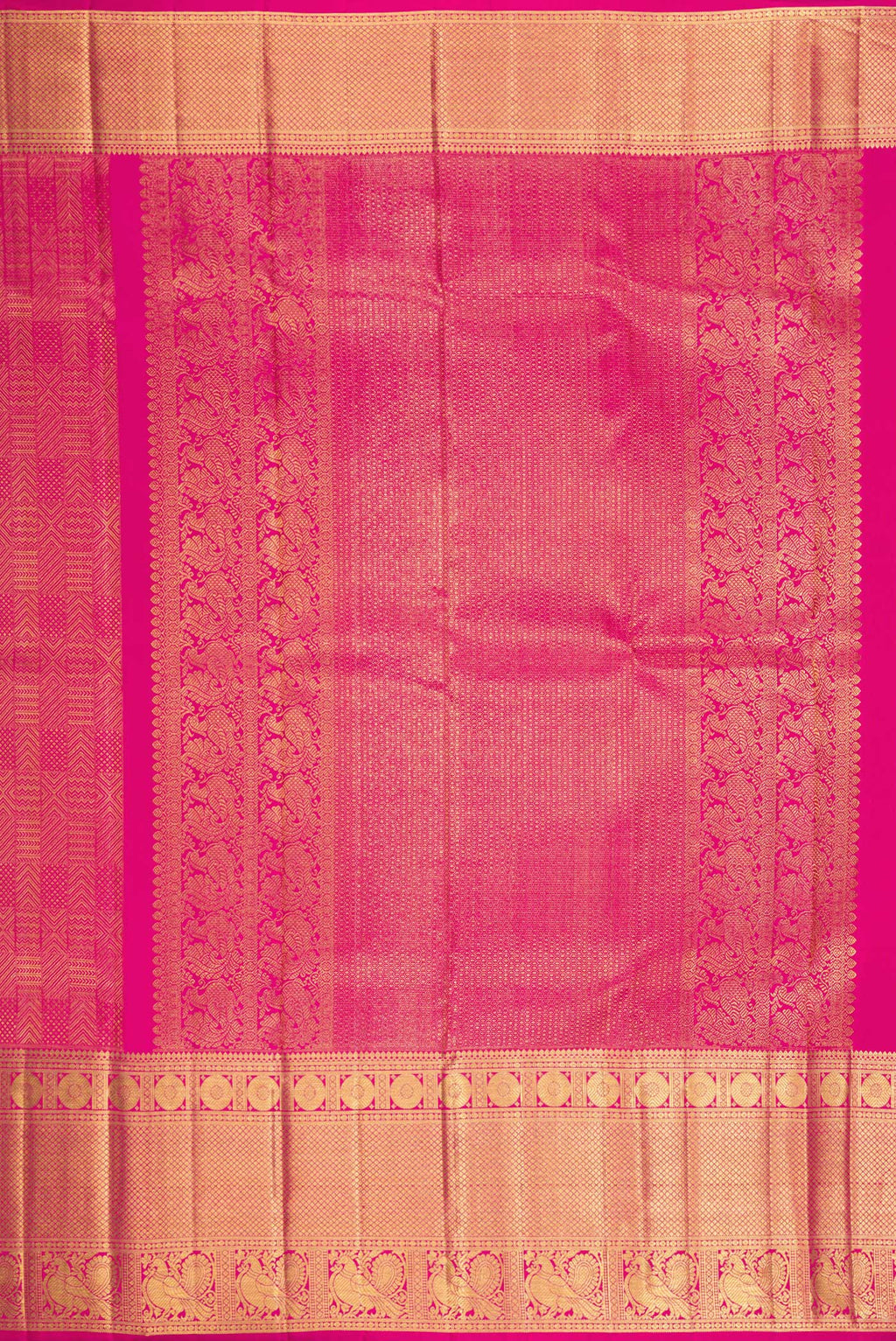 Close up image of the pallu of Dark Pink Kanchipuram Silk Saree with Zari Brocade on the body and Zari Border. 