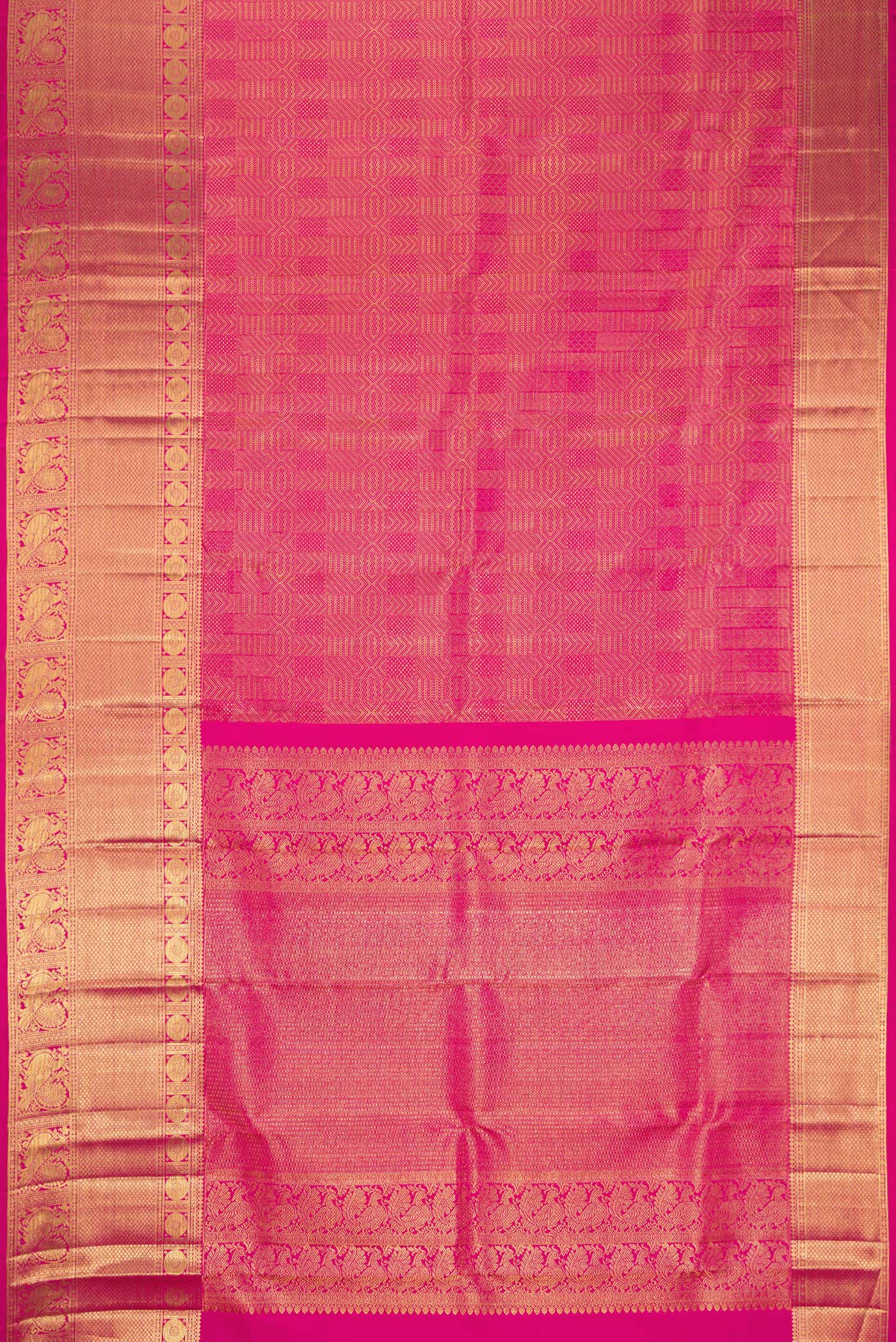 Flat view of Dark Pink Kanchipuram Silk Saree with Zari Brocade on the body and Zari Border. 