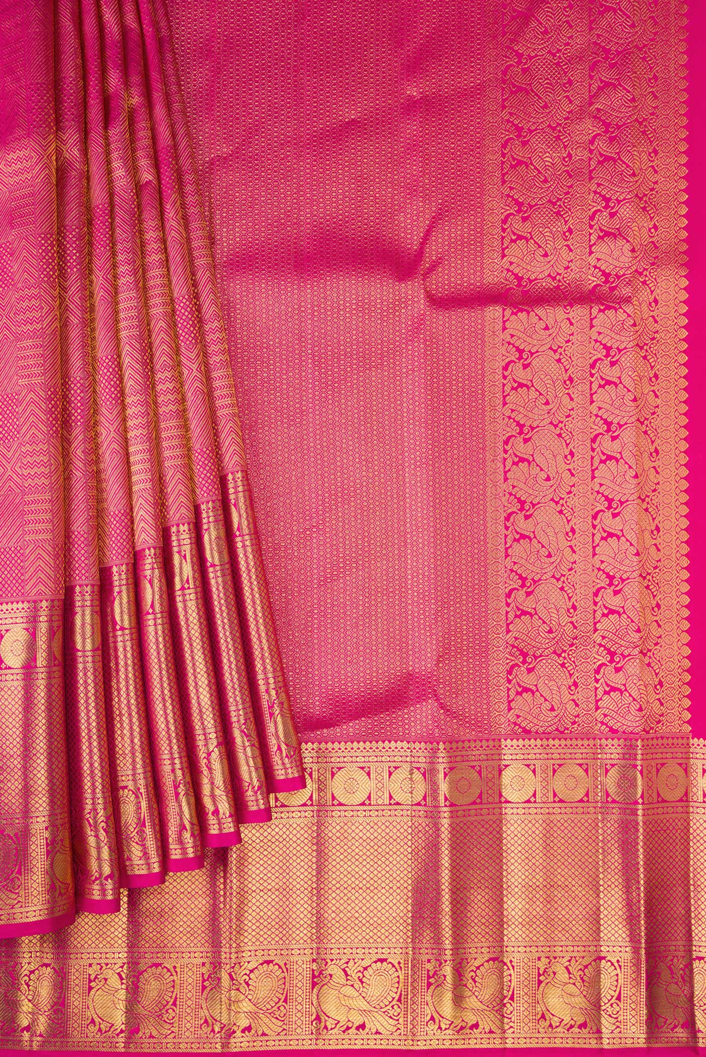 Pleats and pallu of Dark Pink Kanchipuram Silk Saree with Zari Brocade on the body and Zari Border. 