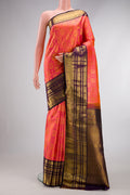 Peach Dual Tone Kanchipuram Silk Saree with Zari Brocade on the body and Zari Border.  displayed on a mannequin
