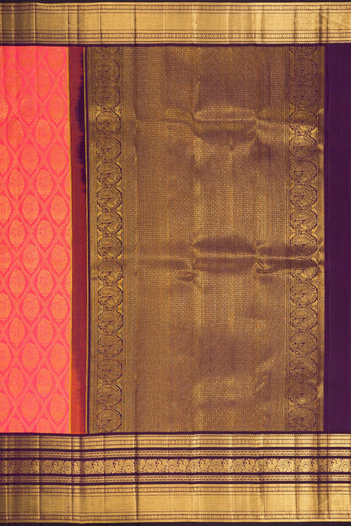 Close up image of the pallu of Peach Dual Tone Kanchipuram Silk Saree with Zari Brocade on the body and Zari Border. 