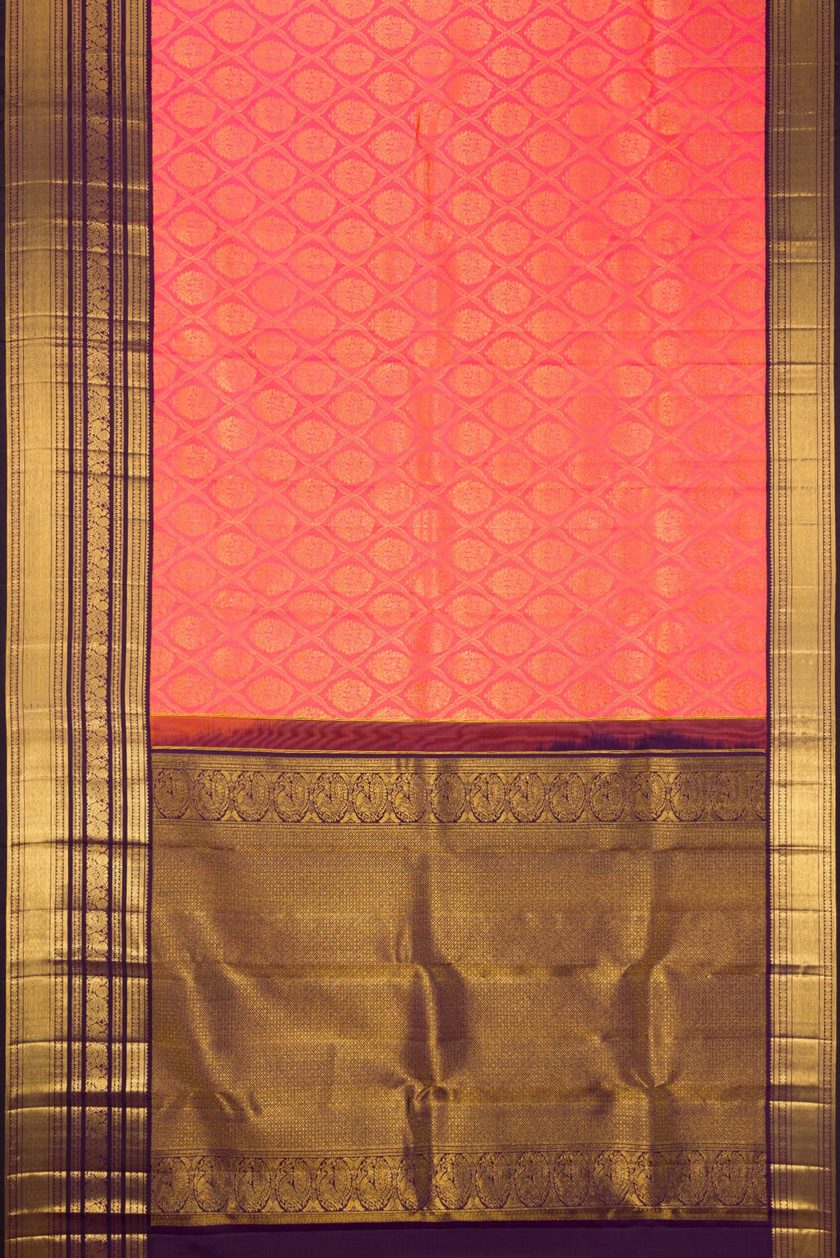 Flat view of Peach Dual Tone Kanchipuram Silk Saree with Zari Brocade on the body and Zari Border. 