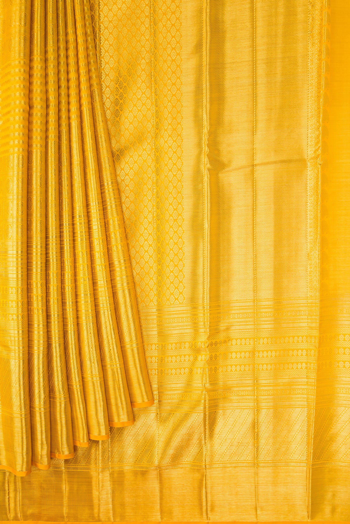Pleats and pallu of Yellow Dual Tone Kanjivaram Silk Saree with Zari Brocade on the body and Zari Border. 