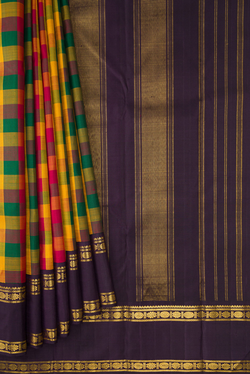 Pleats and pallu of Pure Silk Pure Zari Green, Yelloe and Maroon Color Kanjivaram Saree with Checked design on the body and Zari Border. 