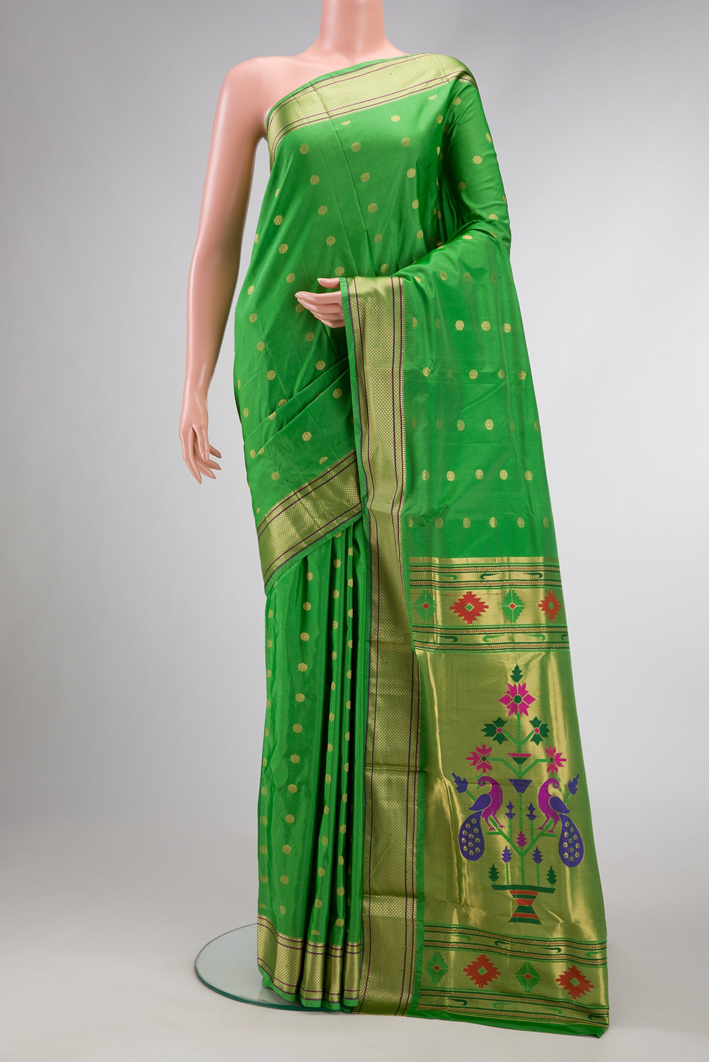 Parrot Green Dual Tone Blended Paithani Silk Saree with Zari Butta on the body and Paithani Border.  displayed on a mannequin