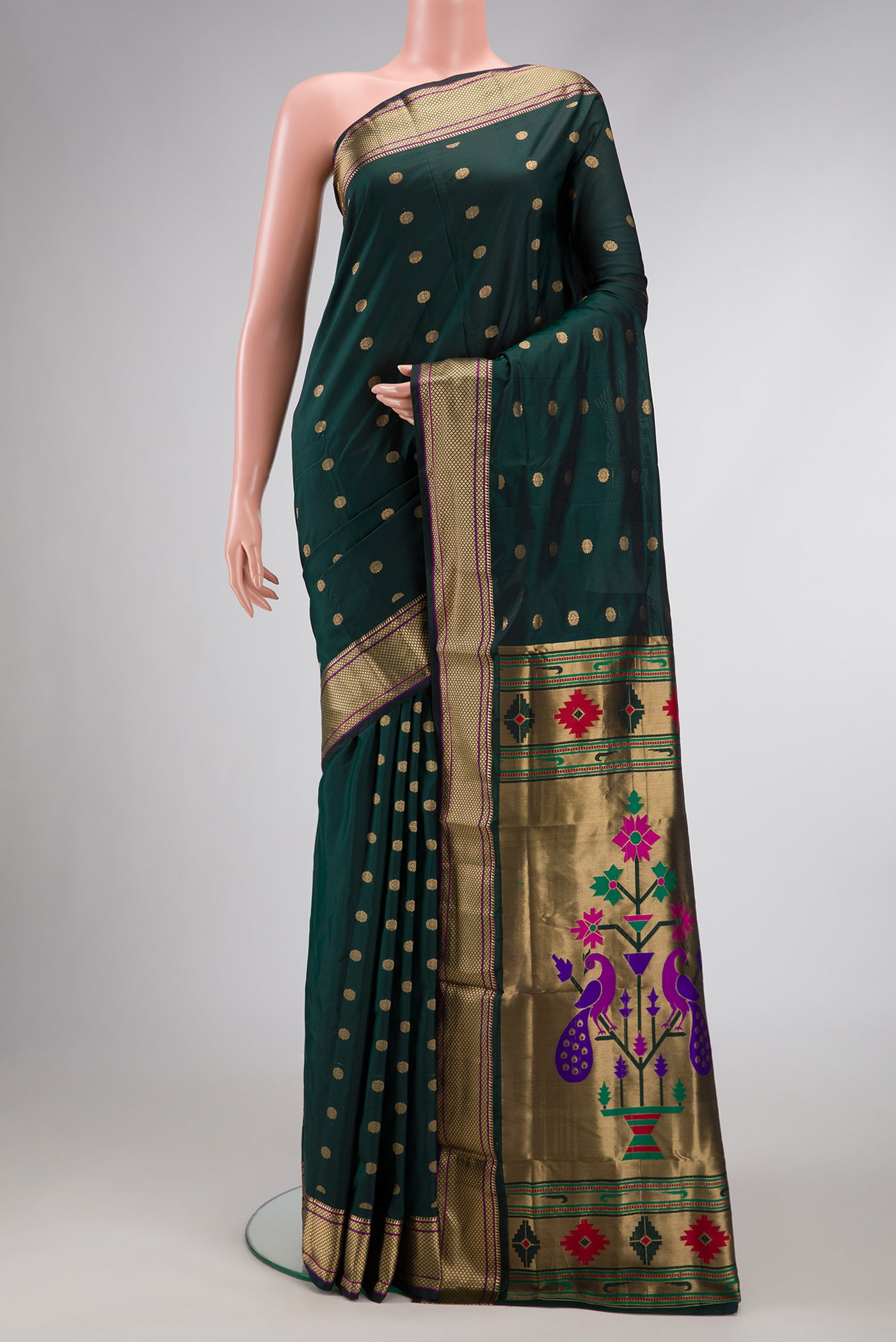 Bottle Green Dual Tone Blended Paithani Silk Saree with Zari Butta on the body and Zari Border.  displayed on a mannequin