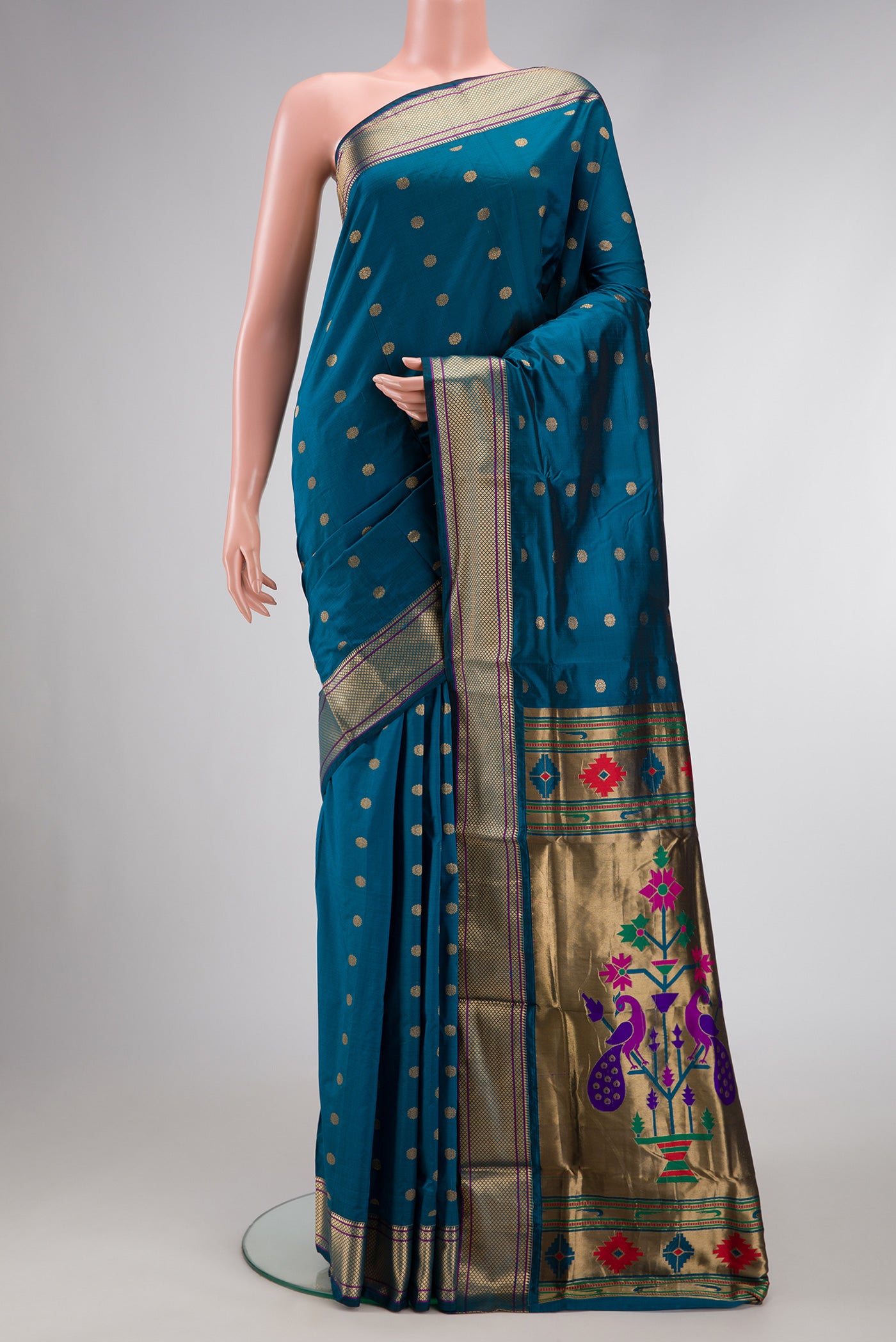 Peacock Blue Dual Tone Blended Paithani Silk Saree with Zari Butta on the body and Zari Border.  displayed on a mannequin