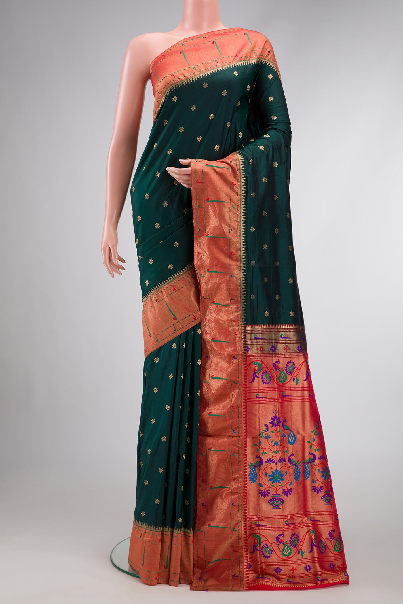 Bottle Green Dual Tone Paithani Silk Saree with Zari Butta on the body and Paithani Border.  displayed on a mannequin