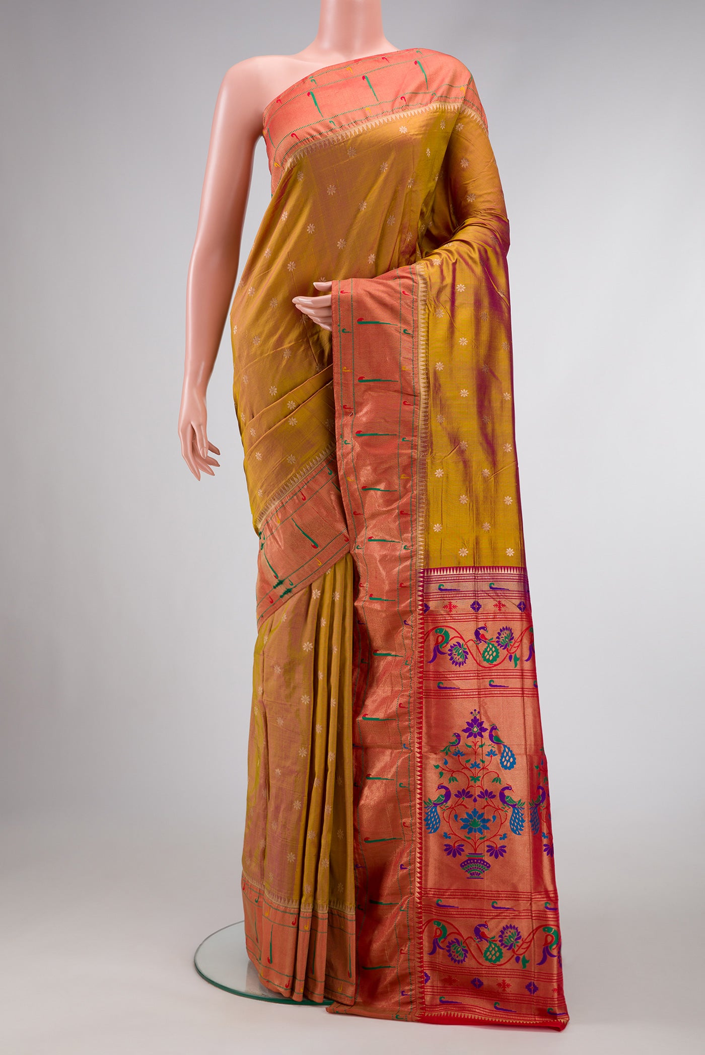Mehandi Green Dual Tone Paithani Silk Saree with Zari Butta on the body and Paithani Border.  displayed on a mannequin