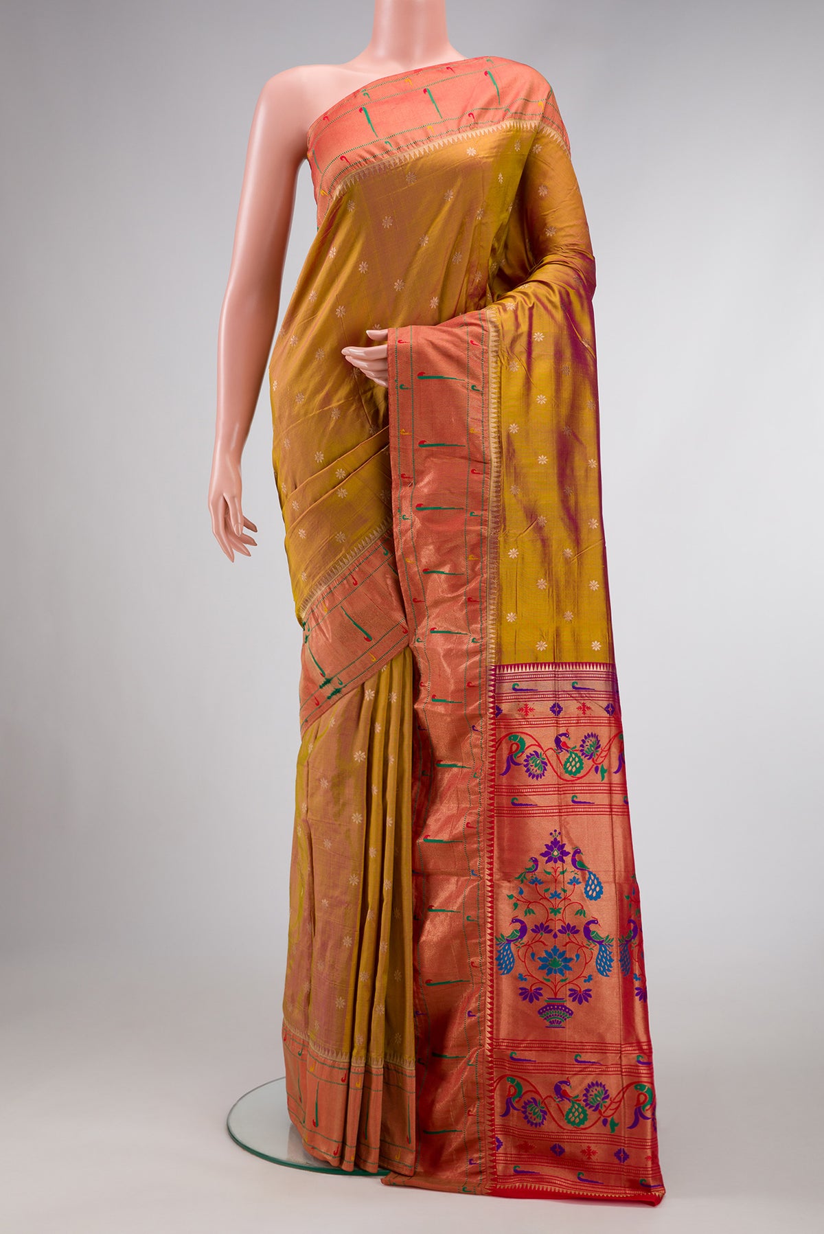 Mehandi Green Dual Tone Paithani Silk Saree with Zari Butta on the body and Paithani Border.  displayed on a mannequin