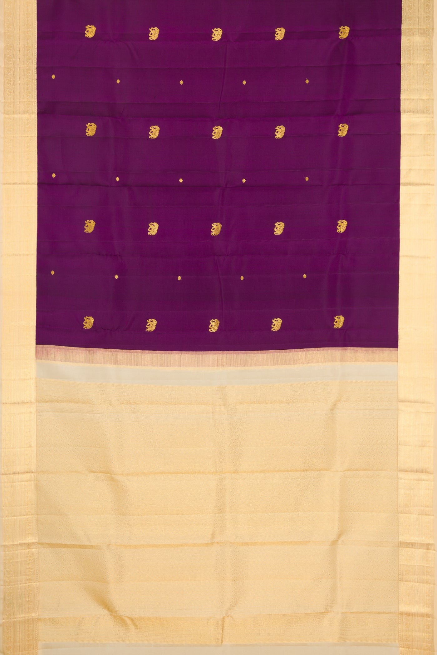 Flat view of Purple Kanchipuram Silk Saree with Zari Butta on the body and Zari Border. 