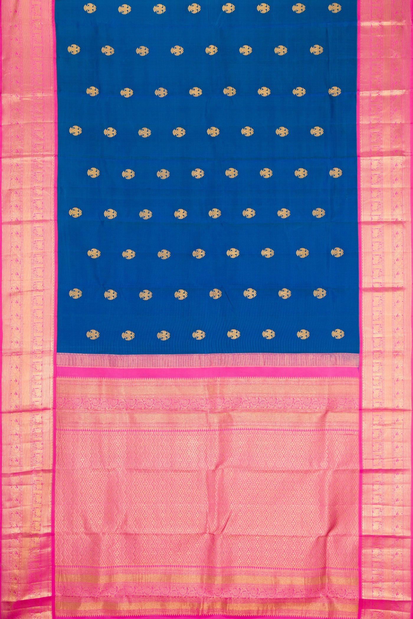 Flat view of Peacock Blue Kanchipuram Silk Saree with Zari Butta on the body and Zari Border. 