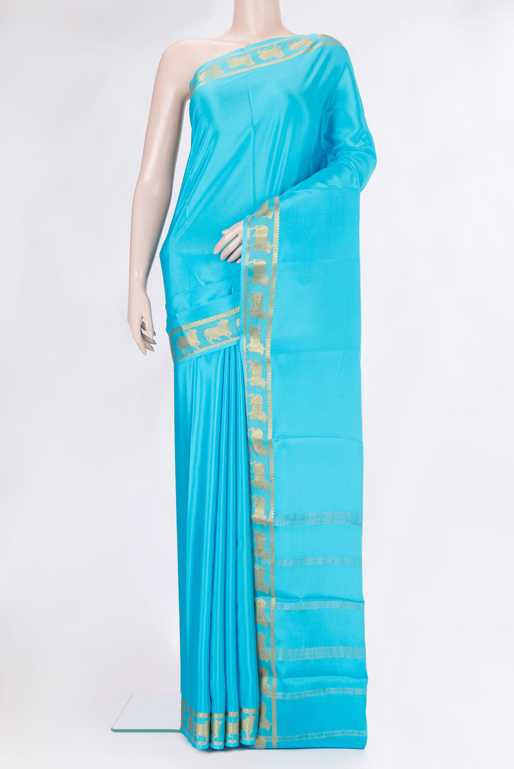 Sky Blue Mysore Silk Saree with Plain Body and Fancy Border.  displayed on a mannequin