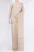 Beige Mysore Silk Saree with Plain Body and Fancy Border.  displayed on a mannequin
