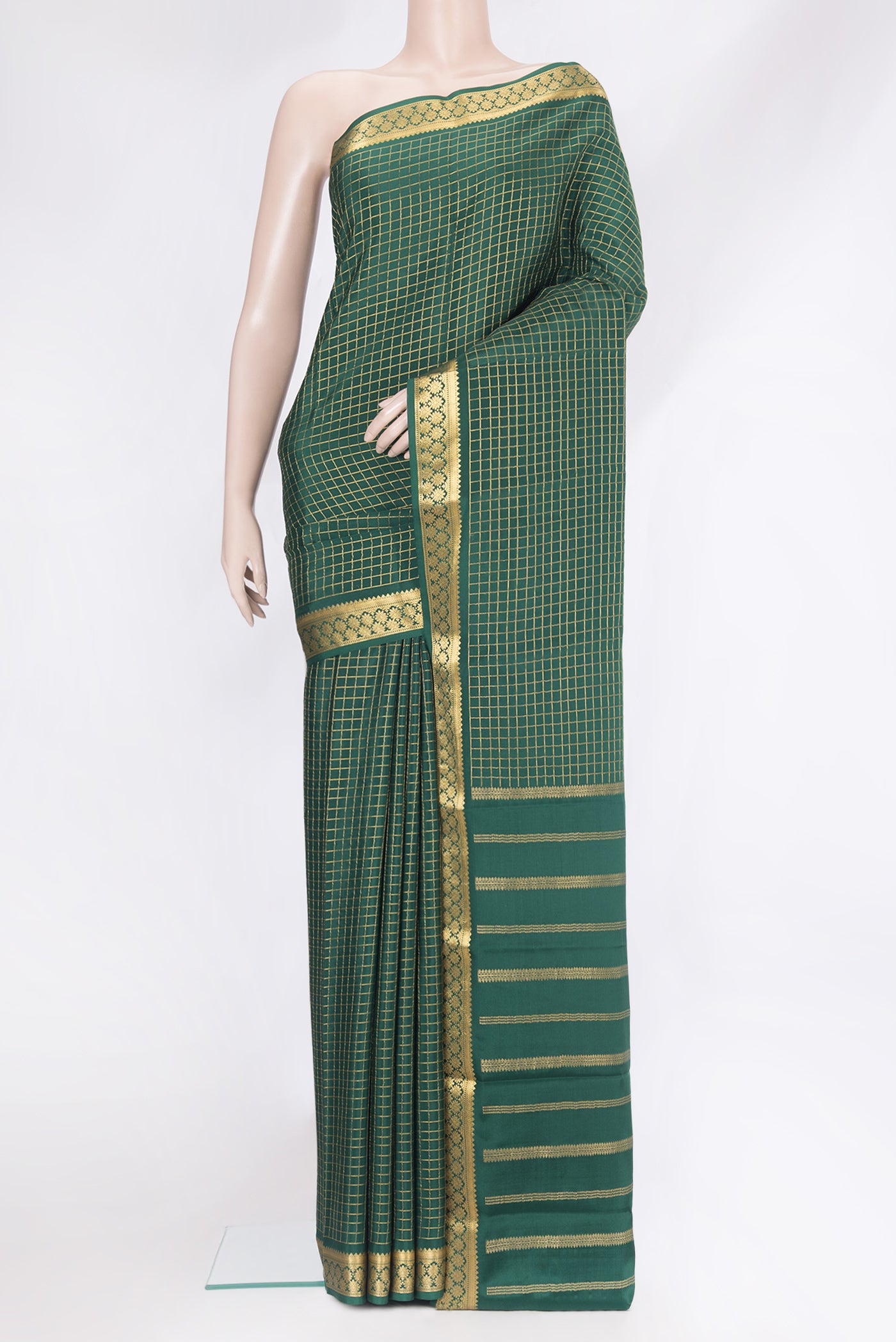 Bottle Green Mysore Silk Saree with Checked design on the body and Zari Border.  displayed on a mannequin