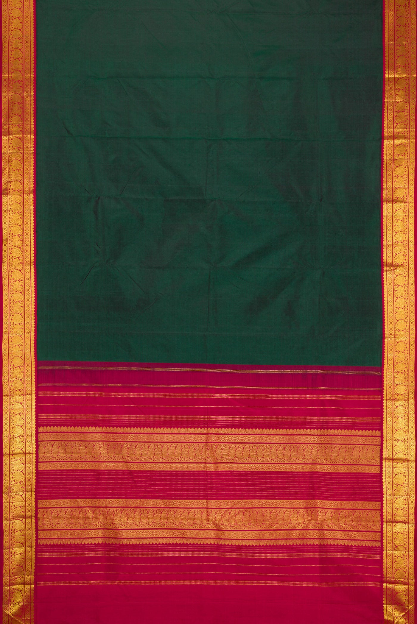 Flat view of Bottle Green Kanjivaram Silk Saree with Plain Body and Zari Border. 