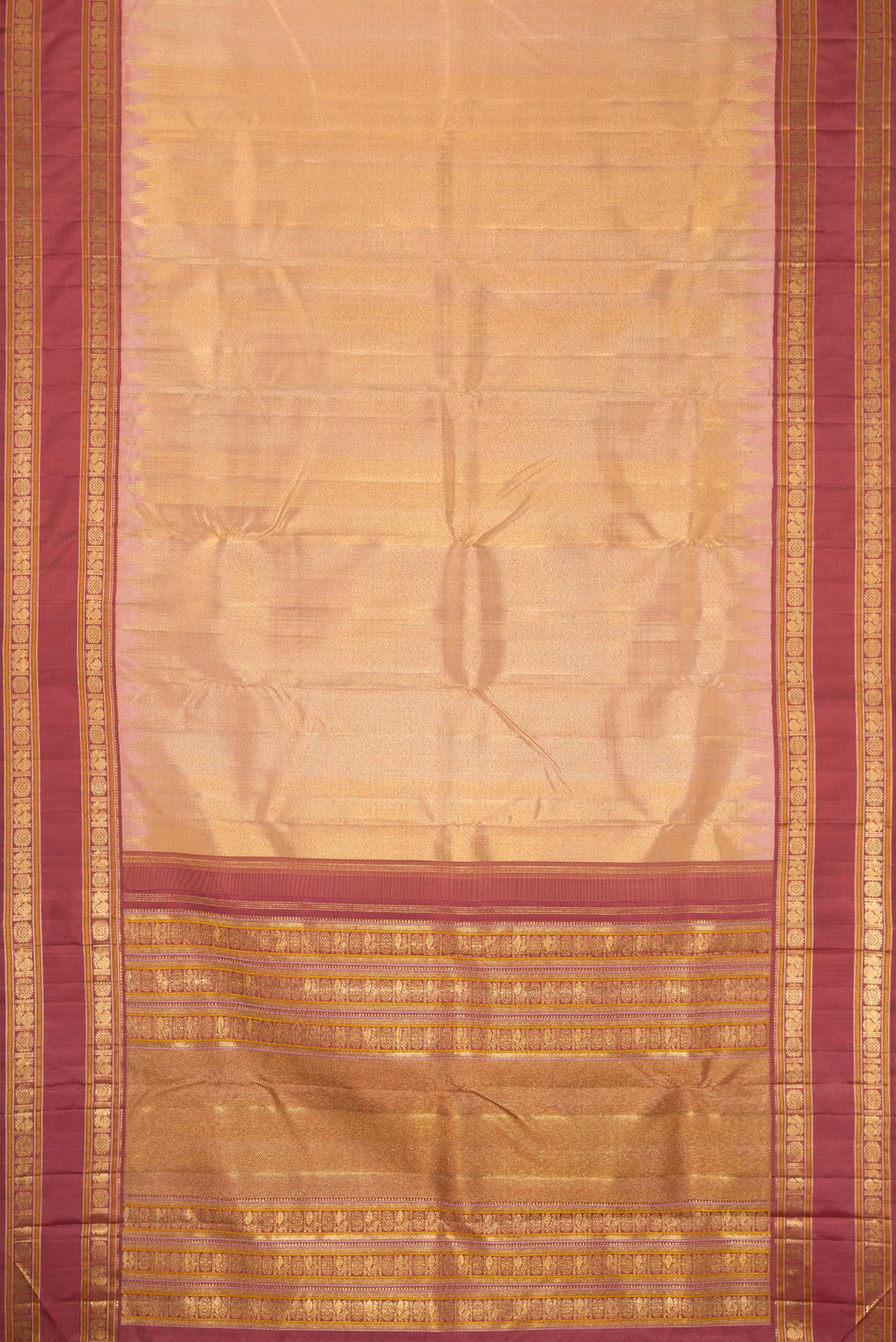 Flat view of Pure Silk Pure Zari Sandal Dual Tone Kanchipuram Saree with Zari Brocade on the body and Zari Border. 
