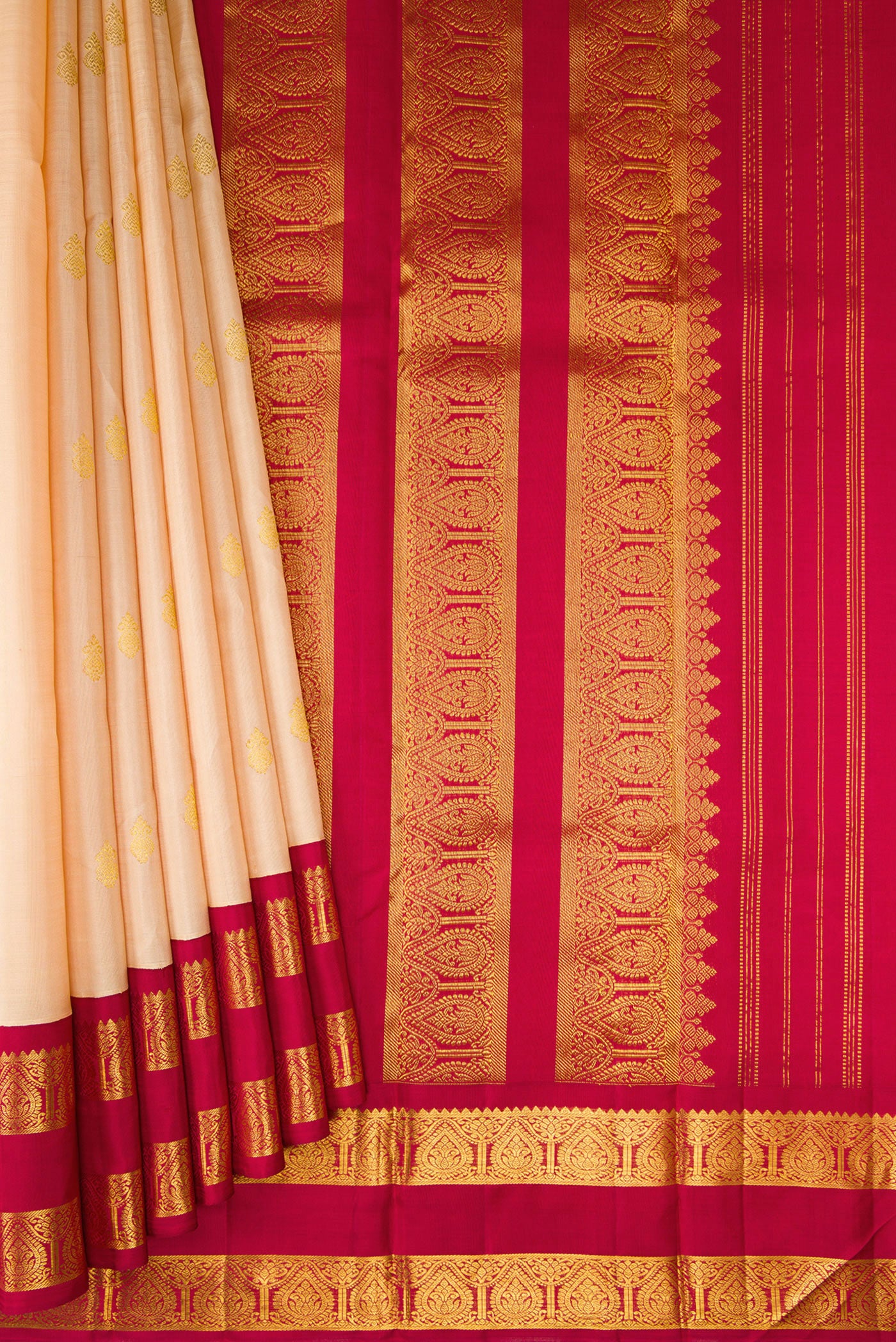 Pleats and pallu of Sandal Kanjivaram Silk Saree with Zari Butta on the body and Zari Border. 