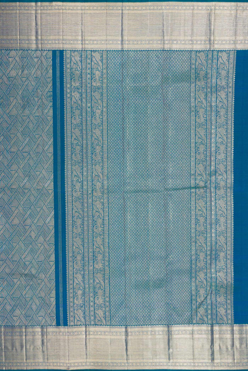 Close up image of the pallu of Peacock Blue Kanchipuram Silk Saree with Zari Brocade on the body and Fancy Border. 